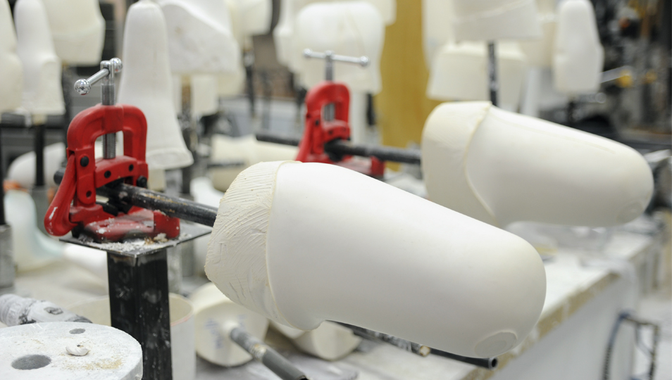 After careful evaluation of the residual limb, positive molds are hand-sculpted.