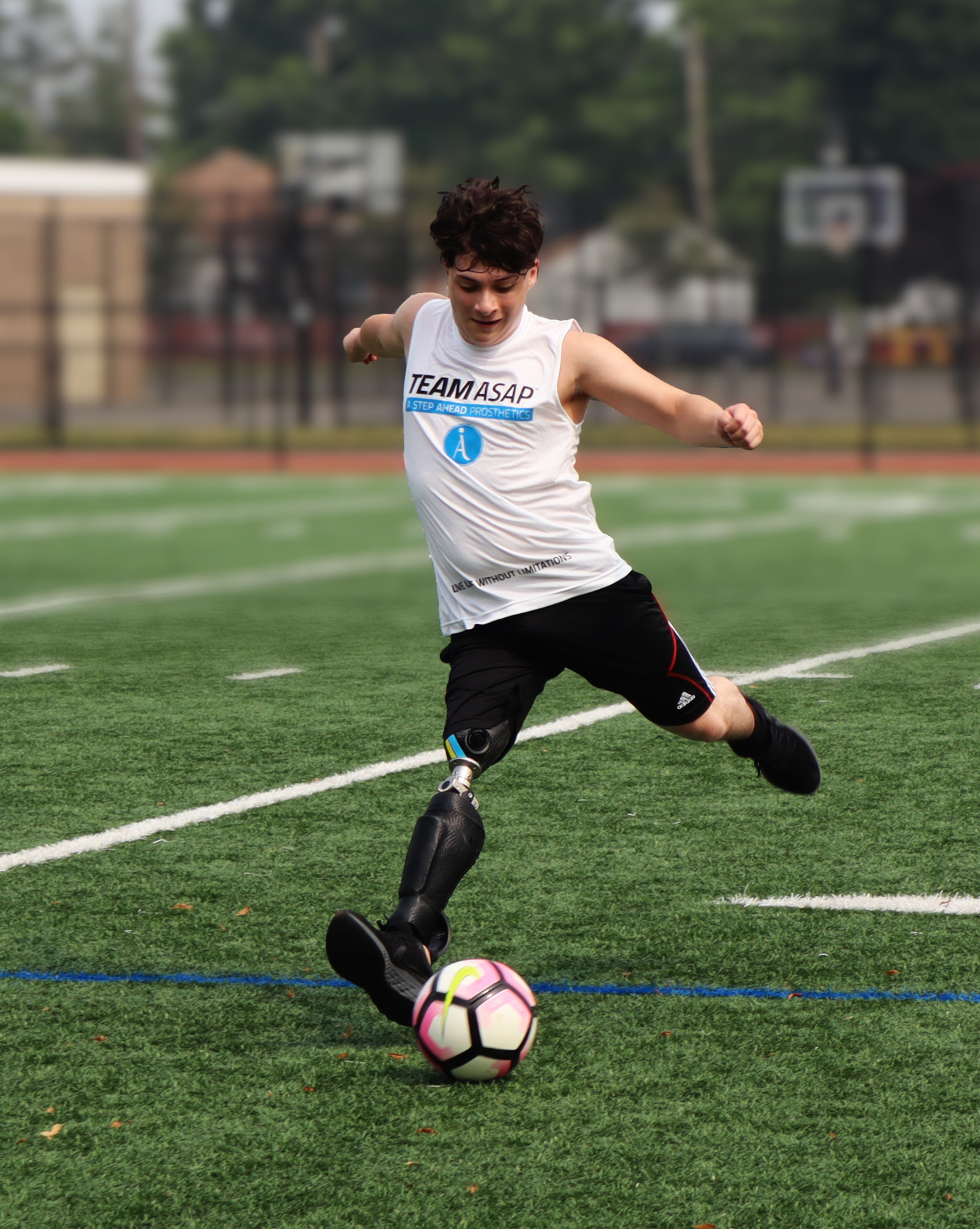 Above knee amputee playing soccer with a high activity leg