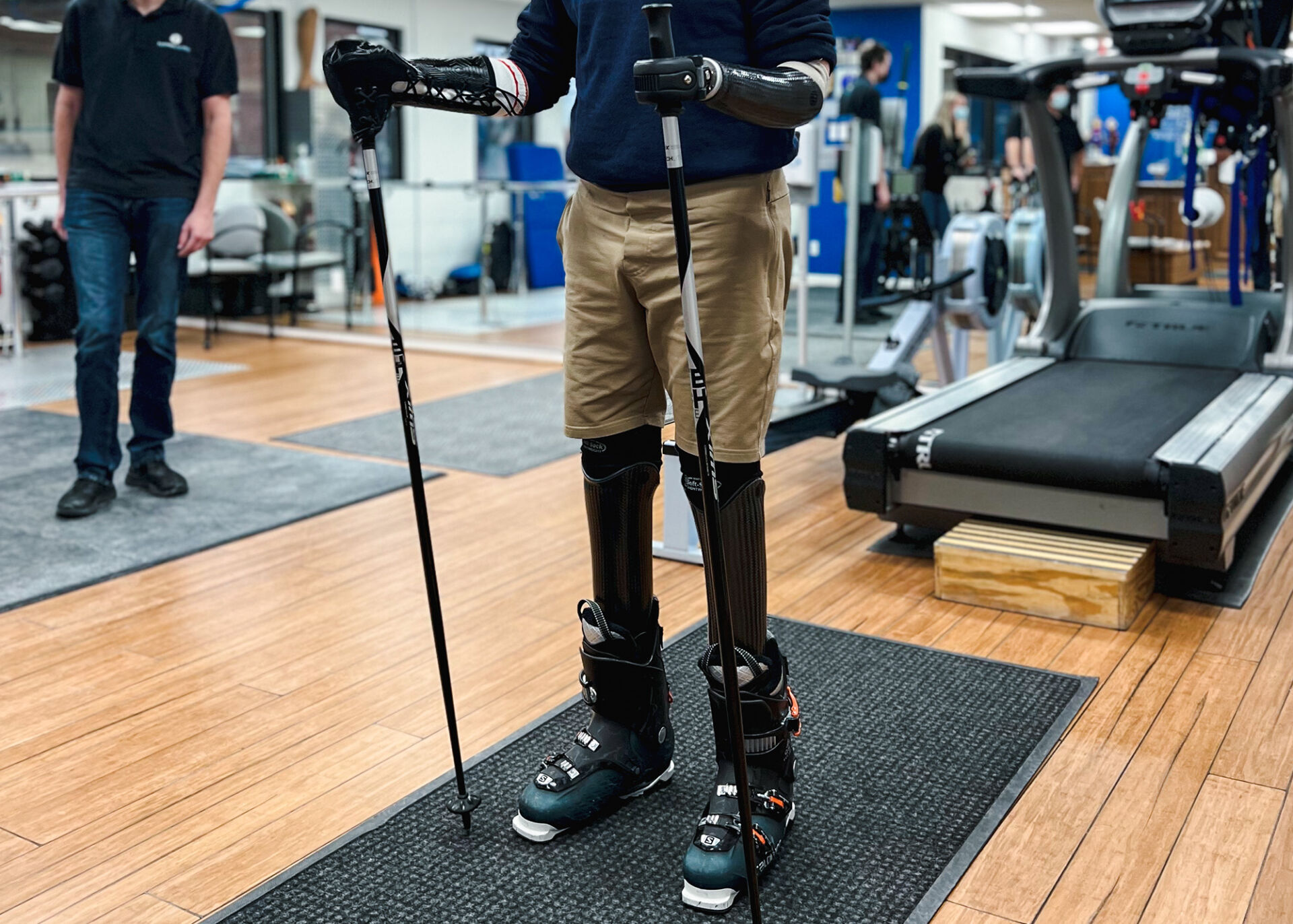 bilateral Below knee amputee in custom skiing prosthetics.