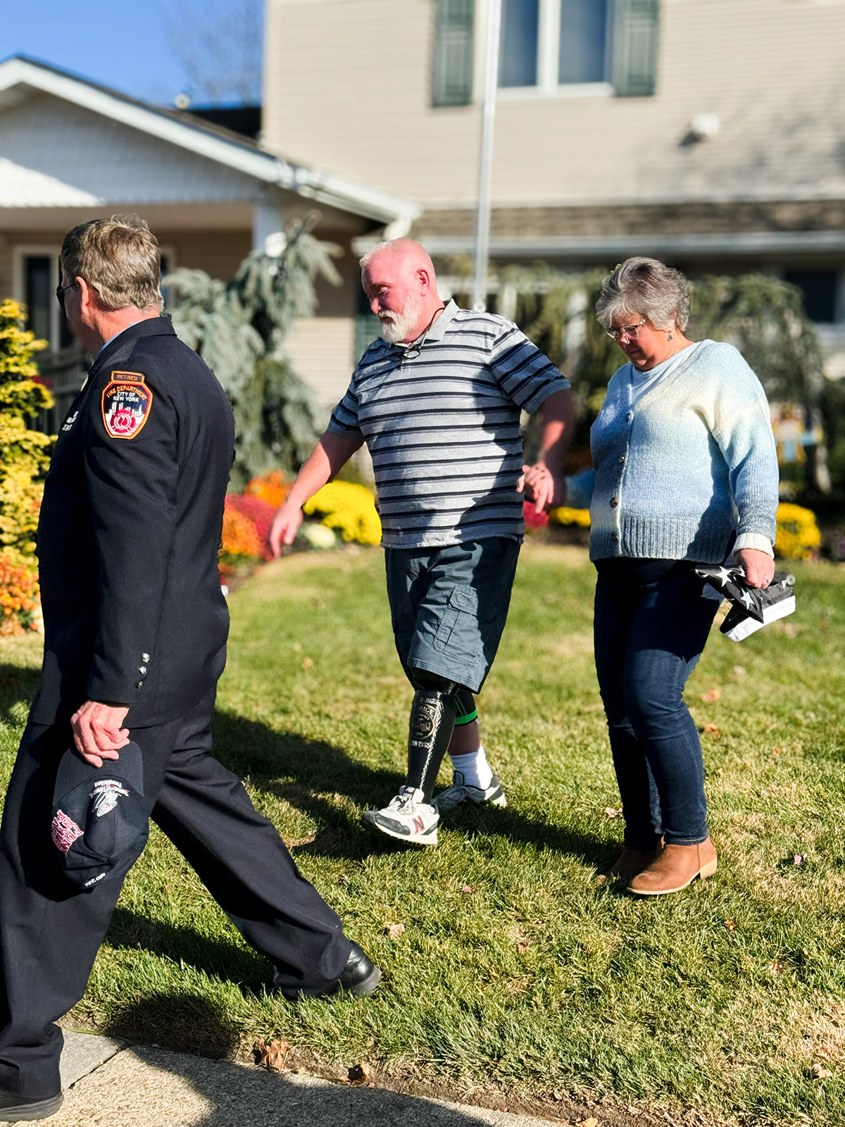 officer, fireman Handicap accessible home for amputee, donated by Tunnel 2 Tower